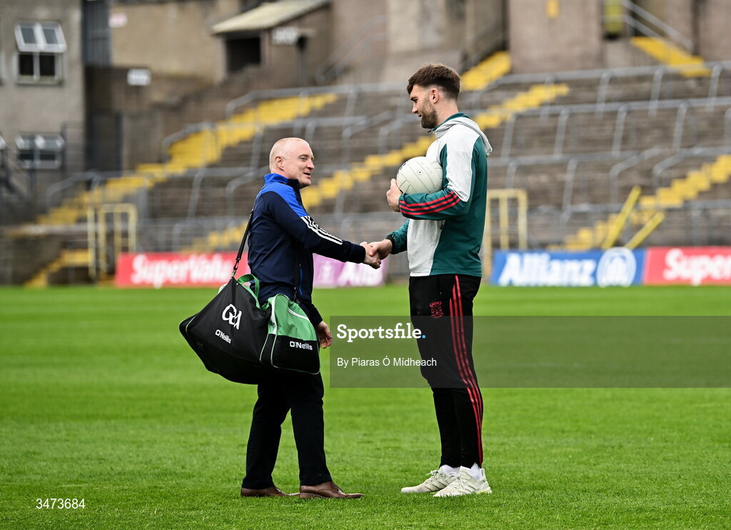 31 May 2026; Aidan O'Shea of Mayo and line umpire Barry Cassidy, left, shake hands before the GAA Football All-Ireland Senior Championship Round 1 match between Monaghan and Mayo at St Tiernach's Park in Clones, Monaghan. Photo by Piaras Ó Mídheach/Sportsfile