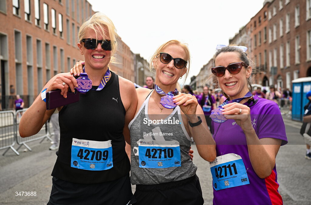 31 May 2026; Participants, from left, Amada Lynch, Orla Lynch and Michelle Lynch, all from Sandyford, Dublin, with their medals after the 2026 Vhi Women’s Mini Marathon. Almost 30,000 women from all over the country took to the streets of Dublin to run, walk and jog the 10km route, raising much needed funds for hundreds of charities around the country. www.vhiwomensminimarathon.ie. Photo by Sam Barnes/Sportsfile
