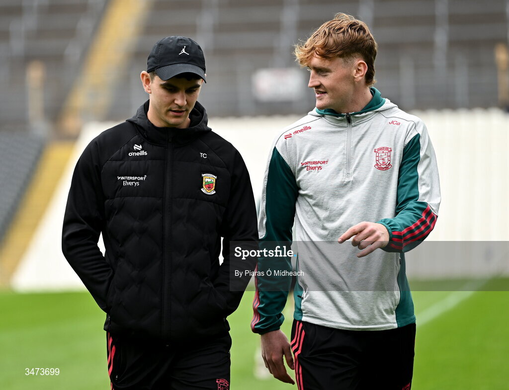 31 May 2026; Mayo footballers Tommy Conroy, left, and Jack Carney walk the pitch before the GAA Football All-Ireland Senior Championship Round 1 match between Monaghan and Mayo at St Tiernach's Park in Clones, Monaghan. Photo by Piaras Ó Mídheach/Sportsfile