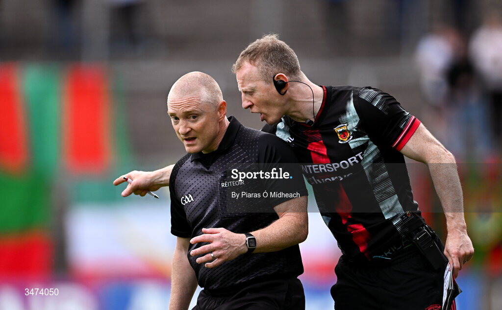 31 May 2026; Mayo selector Colm Boyle has a word by line umpire Barry Cassidy during the GAA Football All-Ireland Senior Championship Round 1 match between Monaghan and Mayo at St Tiernach's Park in Clones, Monaghan. Photo by Piaras Ó Mídheach/Sportsfile