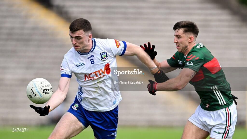 31 May 2026; Micheal McCarville of Monaghan in action against Enda Hession of Mayo during the GAA Football All-Ireland Senior Championship Round 1 match between Monaghan and Mayo at St Tiernach's Park in Clones, Monaghan. Photo by Philip Fitzpatrick/Sportsfile