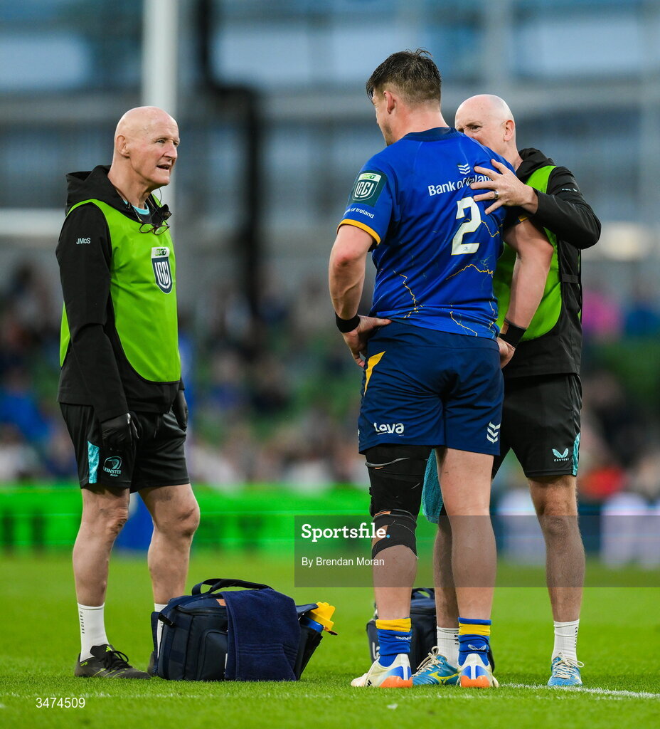 30 May 2026; Dan Sheehan of Leinster receives medical attention from Leinster team doctor Jim McShane, left, and head physiotherapist Garreth Farrell during the United Rugby Championship quarter-final match between Leinster and Lions at the Aviva Stadium in Dublin. Photo by Brendan Moran/Sportsfile