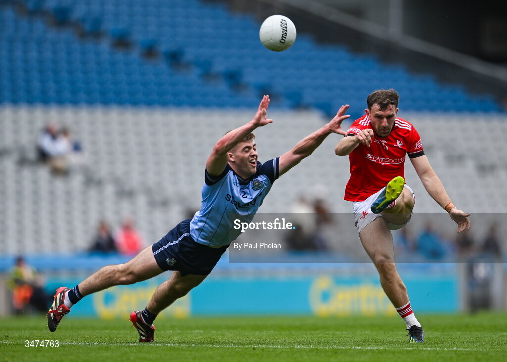 31 May 2026; Sam Mulroy of Louth shoots despite the efforts of Greg McEneaney of Dublin during the GAA Football All-Ireland Senior Championship Round 1 match between Dublin and Louth at Croke Park in Dublin. Photo by Paul Phelan/Sportsfile