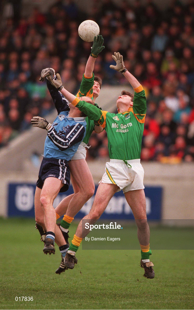 14 February 1999; Brian Stynes of Dublin in action against Adrian Cullen, centre, and Seamus Dillion of Leitrim during the Church & General National Football League Division 1 match between Dublin and Leitrim at Parnell Park in Dublin. Photo by Damien Eagers/Sportsfile