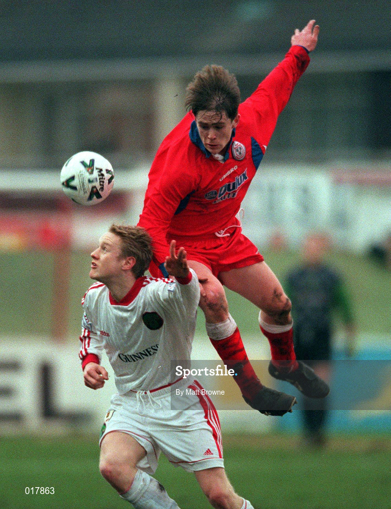 31 January 1999; Colin O'Brien of Cork City in action against Richie Baker of Shelbourne during the Harp Lager National League Premier Division match between Shelbourne and Cork City at Tolka Park in Dublin. Photo by Matt Browne/Sportsfile