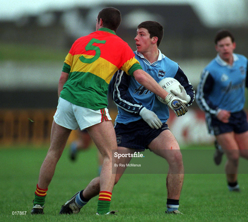 16 January 1999; Colm Moran of Dublin in action against Joe Byrne of Carlow during the O'Byrne Cup Quarter-Final match between Carlow and Dublin at Dr Cullen Park in Carlow. Photo by Ray McManus/Sportsfile