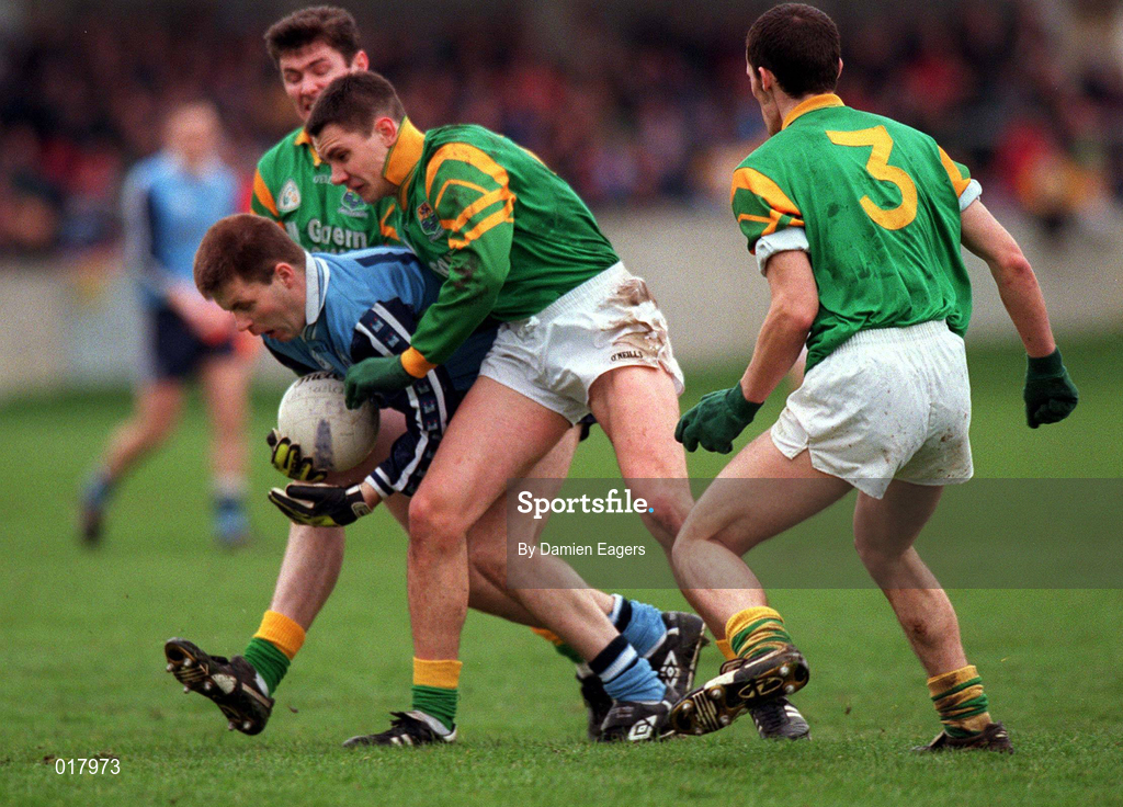 14 February 1999; Dessie Farrell of Dublin in action against James Phelan, centre, and Derek Kelleher, right, of Leitrim during the Church & General National Football League Division 1 match between Dublin and Leitrim at Parnell Park in Dublin. Photo by Damien Eagers/Sportsfile