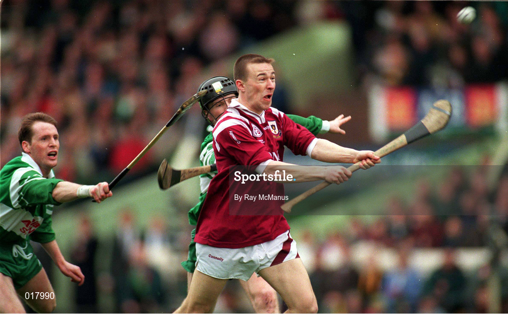 17 March 1997; Eddie Brady of Athenry in action against Sean Power and Frank Lohan of  Wolf Tones during the All-Ireland Senior Club Hurling Championship Final match between Athenry and Wolfe Tones at Croke Park in Dublin. Photo by Ray McManus/Sportsfile
