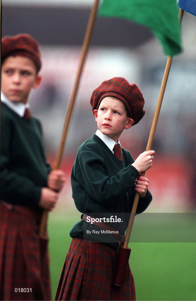 31 January 1999; Two members of the Patrician Primary Pipers band watch the teams arrive onto the field prior to the AIB Leinster Club Football Championship Final 2nd Replay match between Éire Og and Kilmacud Crokes at St Conleths Park in Newbridge, Kildare. Photo by Ray McManus/Sportsfile