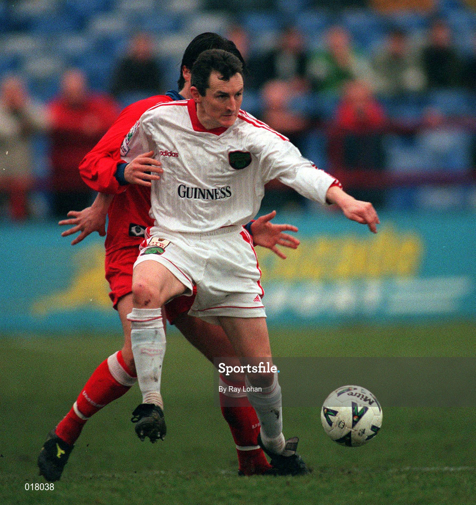 31 January 1999; John Caulfield of Cork City in action against Greg Costello of Shelbourne during the Harp Lager National League Premier Division match between Shelbourne and Cork City at Tolka Park in Dublin. Photo by Ray Lohan/Sportsfile