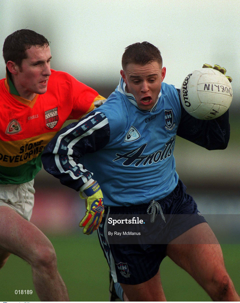 16 January 1999; Keith Galvin of Dublin in action against Ken Walker of Carlow during the O'Byrne Cup Quarter-Final match between Carlow and Dublin at Dr Cullen Park in Carlow. Photo by Ray McManus/Sportsfile