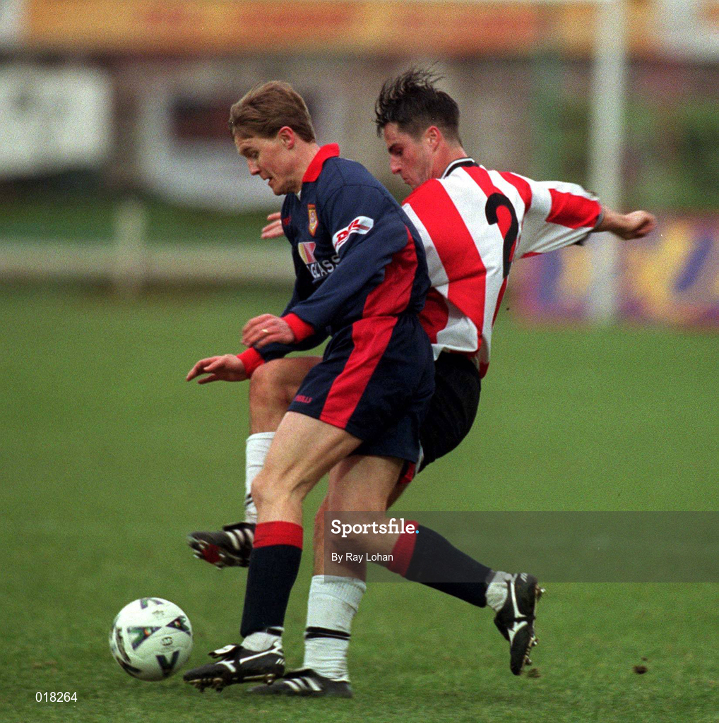 14 February 1999; Martin O'Reilly of St Patrick's Athletic  in action against Darren Kelly of Derry City during the Harp Lager National League Premier Division match between Derry City and St Patrick's Athletic at The Brandywell Stadium in Derry. Photo by Ray Lohan/Sportsfile