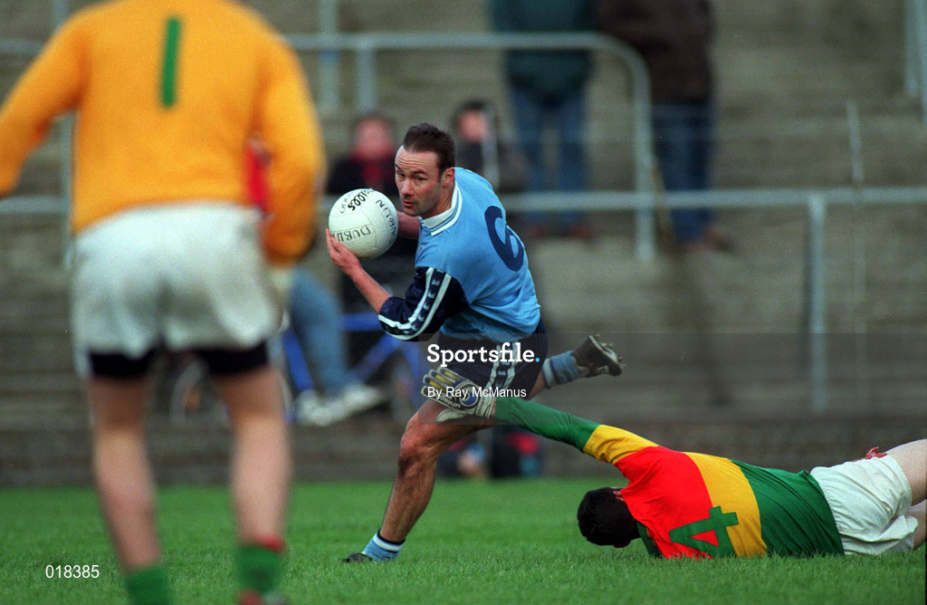 16 January 1999; Paul Curran of Dublin in action against John McGrath of Carlow during the O'Byrne Cup Quarter-Final match between Carlow and Dublin at Dr Cullen Park in Carlow. Photo by Ray McManus/Sportsfile