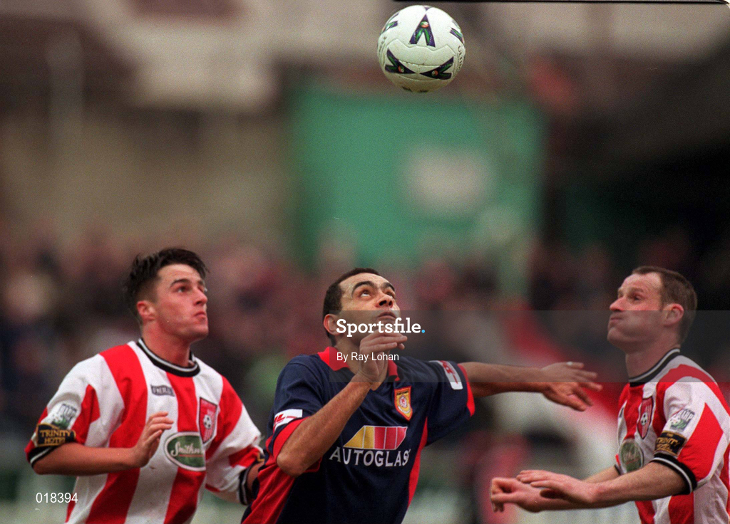 14 February 1999; Paul Osam of St Patrick's Athletic  in action against David Platt, left, and Paul Hegarty of Derry City during the Harp Lager National League Premier Division match between Derry City and St Patrick's Athletic at The Brandywell Stadium in Derry. Photo by Ray Lohan/Sportsfile