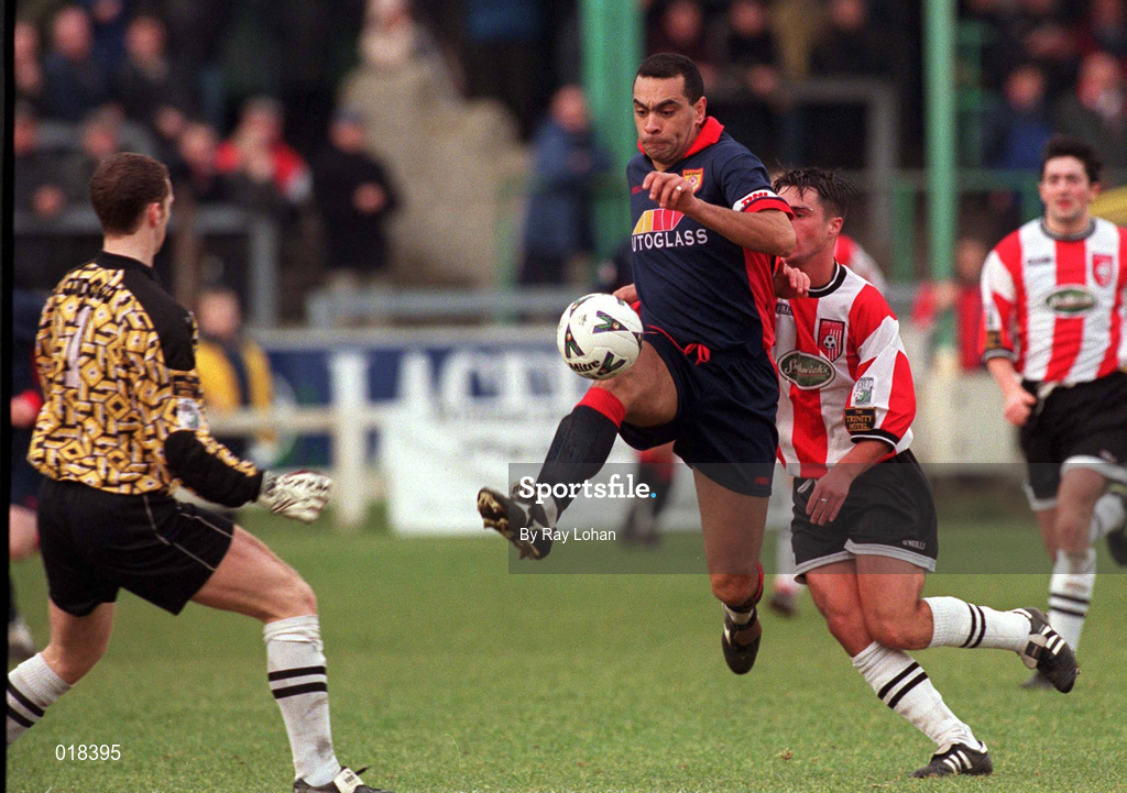 14 February 1999; Paul Osam St Patrick's Athletic in action against  David Platt and Darren Kelly of Derry City during the Harp Lager National League Premier Division match between Derry City and St Patrick's Athletic at The Brandywell Stadium in Derry. Photo by Ray Lohan/Sportsfile