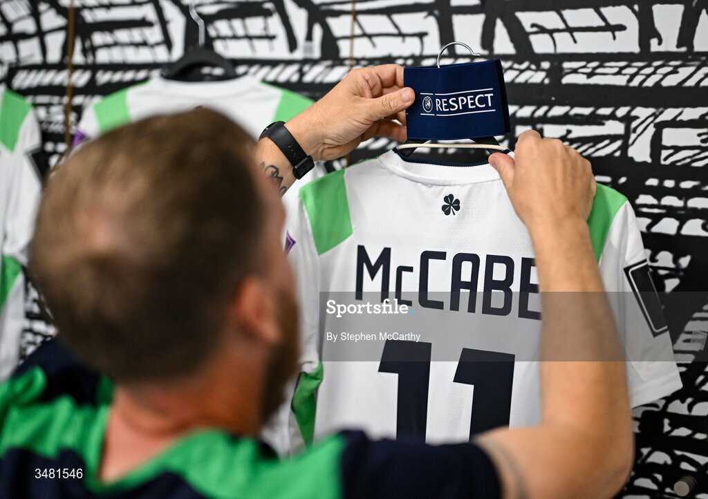 9 June 2026; Kitman Barry Sanfey adjusts the captain's armband assisgned to Katie McCabe's jersey in the Republic of Ireland dressing room before the 2027 FIFA Women’s World Cup Qualifier match between France and Republic of Ireland at Stade des Alpes in Grenoble, France. Photo by Stephen McCarthy/Sportsfile