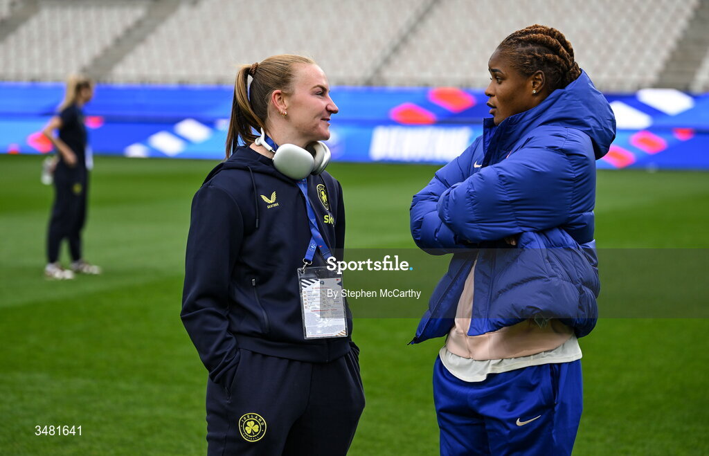 9 June 2026; Republic of Ireland goalkeeper Courtney Brosnan speaks to Kelly Gago of France, her Everton teammate, before the 2027 FIFA Women’s World Cup Qualifier match between France and Republic of Ireland at Stade des Alpes in Grenoble, France. Photo by Stephen McCarthy/Sportsfile