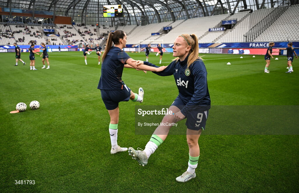 9 June 2026; Anna Patten and Amber Barrett of Republic of Ireland warm up before the 2027 FIFA Women’s World Cup Qualifier match between France and Republic of Ireland at Stade des Alpes in Grenoble, France. Photo by Stephen McCarthy/Sportsfile