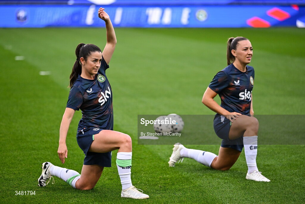 9 June 2026; Marissa Sheva and Katie McCabe of Republic of Ireland warm up before the 2027 FIFA Women’s World Cup Qualifier match between France and Republic of Ireland at Stade des Alpes in Grenoble, France. Photo by Stephen McCarthy/Sportsfile