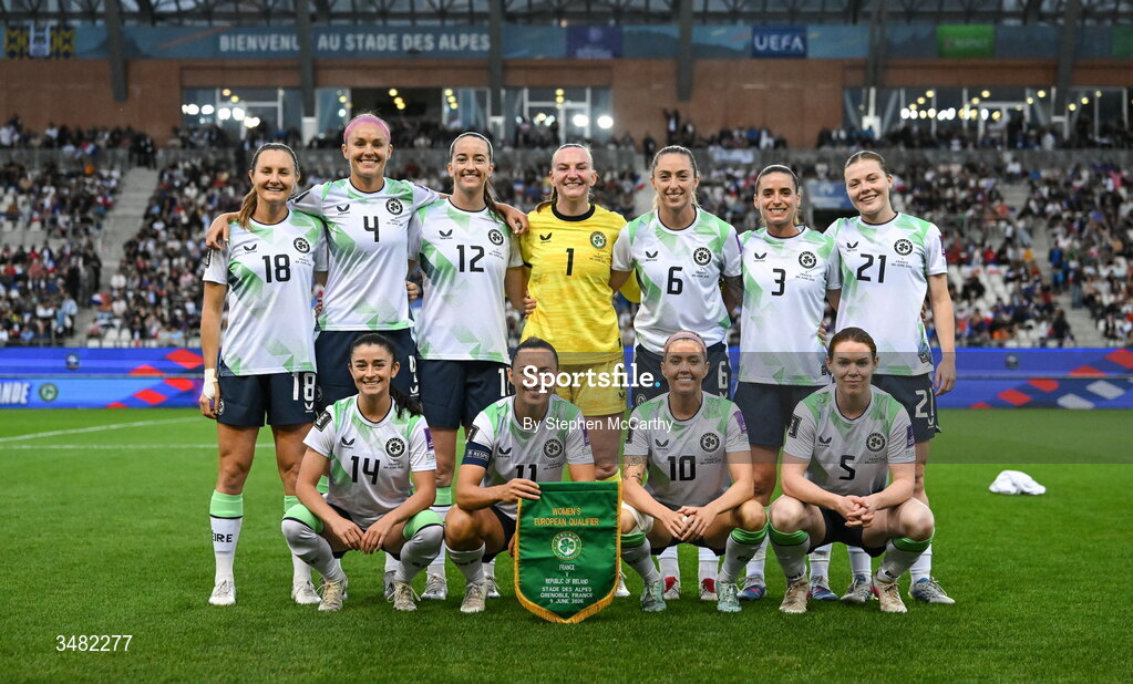 9 June 2026; The Republic of Ireland team back row, from left, Kyra Carusa, Caitlin Hayes, Anna Patten, goalkeeper Courtney Brosnan, Megan Connolly, Chloe Mustaki and Emily Murphy, front row, from left, Marissa Sheva, Katie McCabe, Denise O’Sullivan and Aoife Mannion before the 2027 FIFA Women’s World Cup Qualifier match between France and Republic of Ireland at Stade des Alpes in Grenoble, France. Photo by Stephen McCarthy/Sportsfile