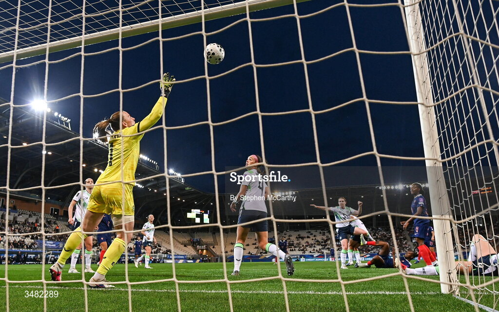 9 June 2026; Melvine Malard of France, second from right, shoots to score her side's first goal as Republic of Ireland goalkeeper Courtney Brosnan attempts to make a save during the 2027 FIFA Women’s World Cup Qualifier match between France and Republic of Ireland at Stade des Alpes in Grenoble, France. Photo by Stephen McCarthy/Sportsfile
