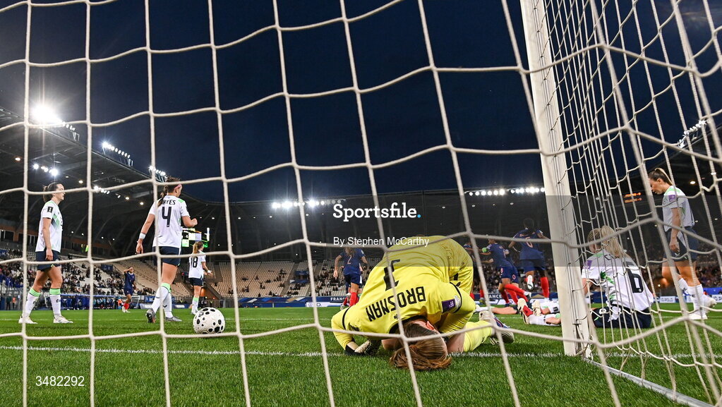 9 June 2026; Republic of Ireland goalkeeper Courtney Brosnan and teammates reacts after their side concede a first goal scored by Melvine Malard of France, hidden, during the 2027 FIFA Women’s World Cup Qualifier match between France and Republic of Ireland at Stade des Alpes in Grenoble, France. Photo by Stephen McCarthy/Sportsfile