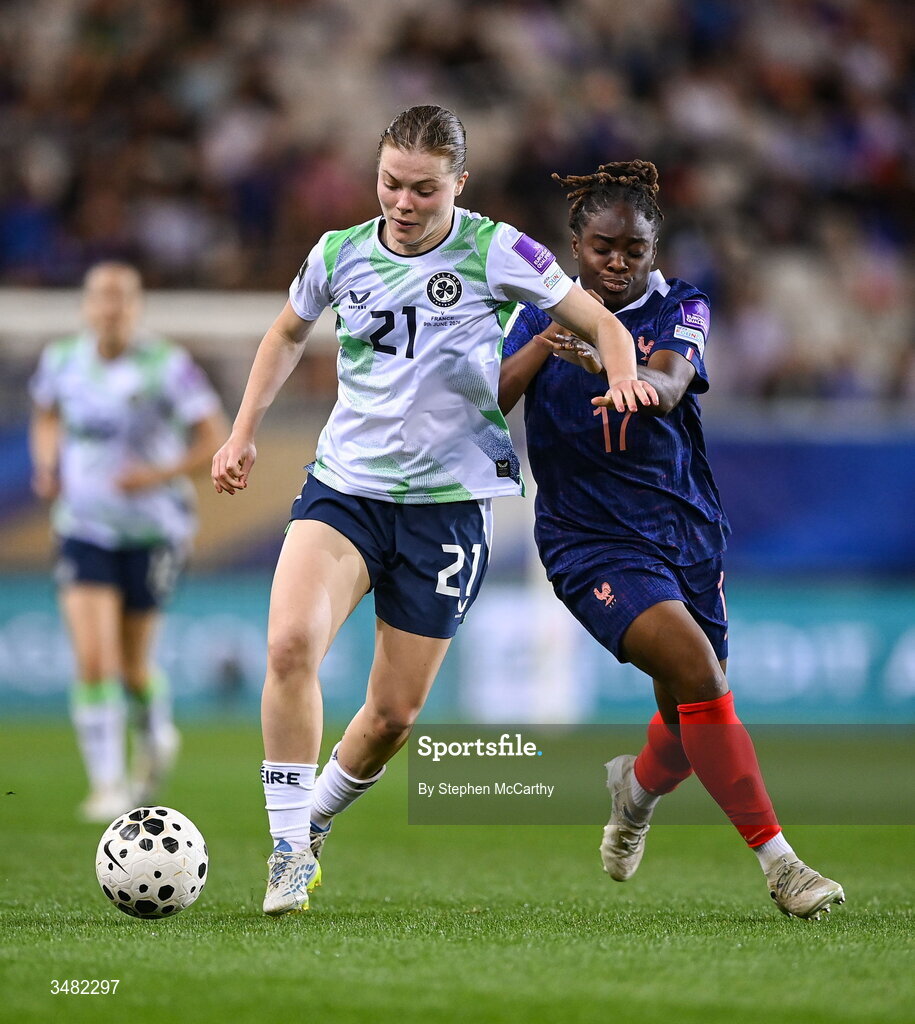 9 June 2026; Emily Murphy of Republic of Ireland in action against Sandy Baltimore of France during the 2027 FIFA Women’s World Cup Qualifier match between France and Republic of Ireland at Stade des Alpes in Grenoble, France. Photo by Stephen McCarthy/Sportsfile