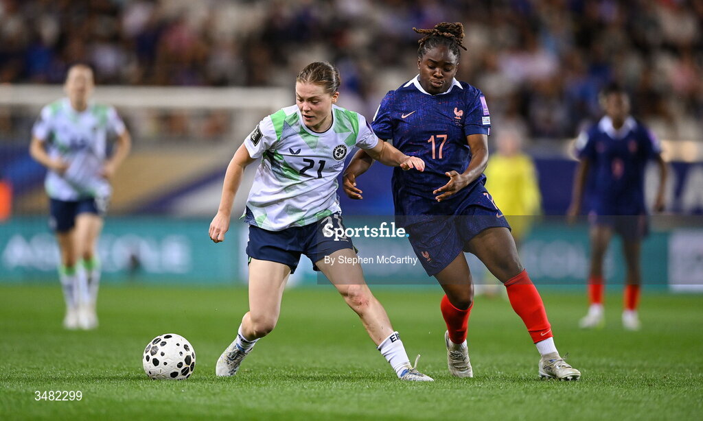 9 June 2026; Emily Murphy of Republic of Ireland in action against Sandy Baltimore of France during the 2027 FIFA Women’s World Cup Qualifier match between France and Republic of Ireland at Stade des Alpes in Grenoble, France. Photo by Stephen McCarthy/Sportsfile