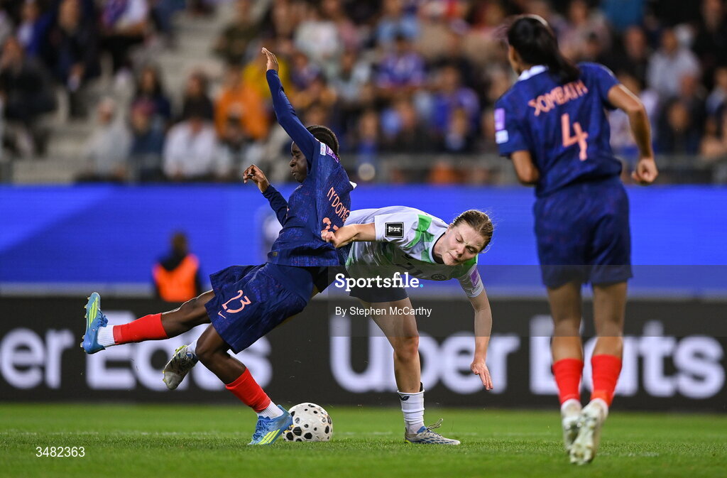 9 June 2026; Emily Murphy of Republic of Ireland in action against Melween N'Dongala of France during the 2027 FIFA Women’s World Cup Qualifier match between France and Republic of Ireland at Stade des Alpes in Grenoble, France. Photo by Stephen McCarthy/Sportsfile