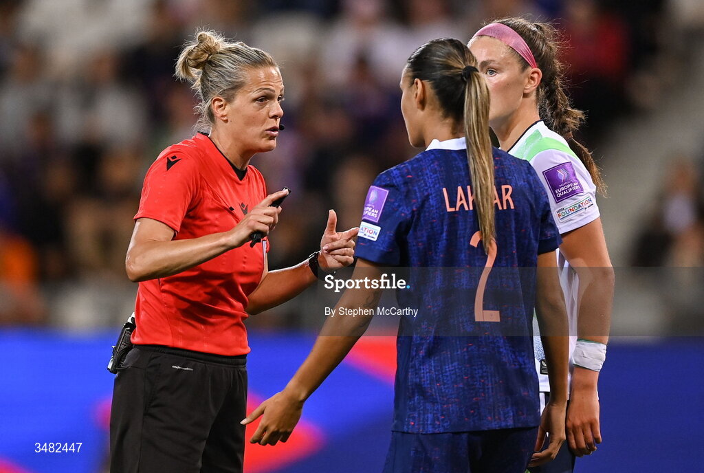 9 June 2026; Referee Désirée Blanco with Maelle Lakrar of France and Caitlin Hayes of Republic of Ireland during the 2027 FIFA Women’s World Cup Qualifier match between France and Republic of Ireland at Stade des Alpes in Grenoble, France. Photo by Stephen McCarthy/Sportsfile