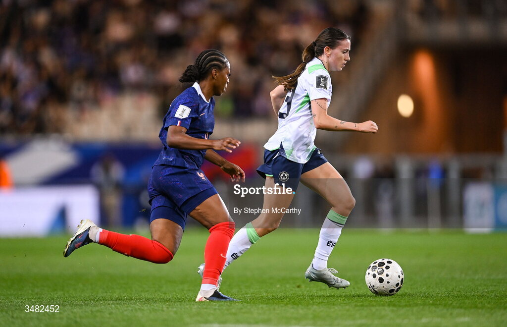 9 June 2026; Abbie Larkin of Republic of Ireland in action against Grace Geyoro of France during the 2027 FIFA Women’s World Cup Qualifier match between France and Republic of Ireland at Stade des Alpes in Grenoble, France. Photo by Stephen McCarthy/Sportsfile