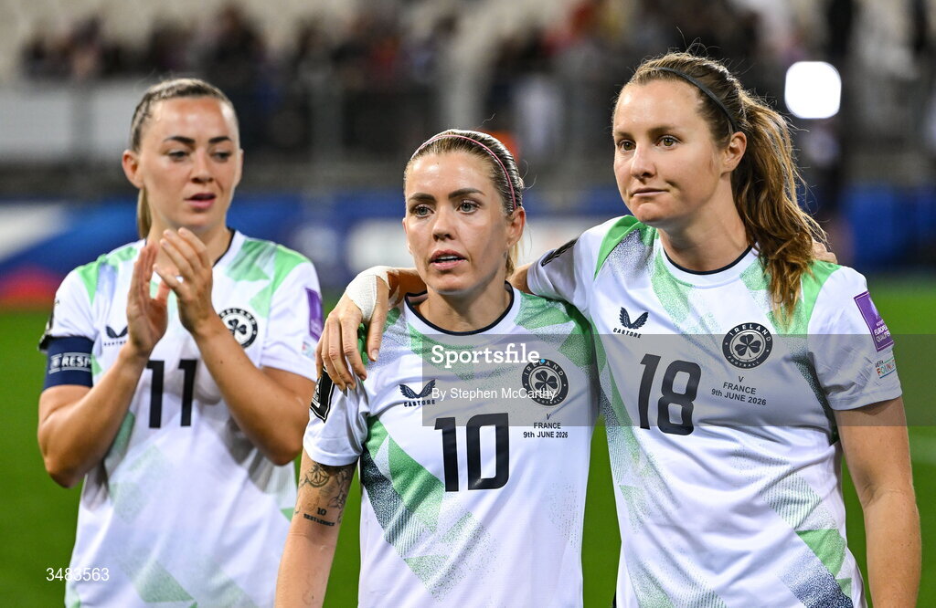 9 June 2026; Republic of Ireland players, from left, Katie McCabe, Denise O’Sullivan and Kyra Carusa following their side's defeat in the 2027 FIFA Women’s World Cup Qualifier match between France and Republic of Ireland at Stade des Alpes in Grenoble, France. Photo by Stephen McCarthy/Sportsfile
