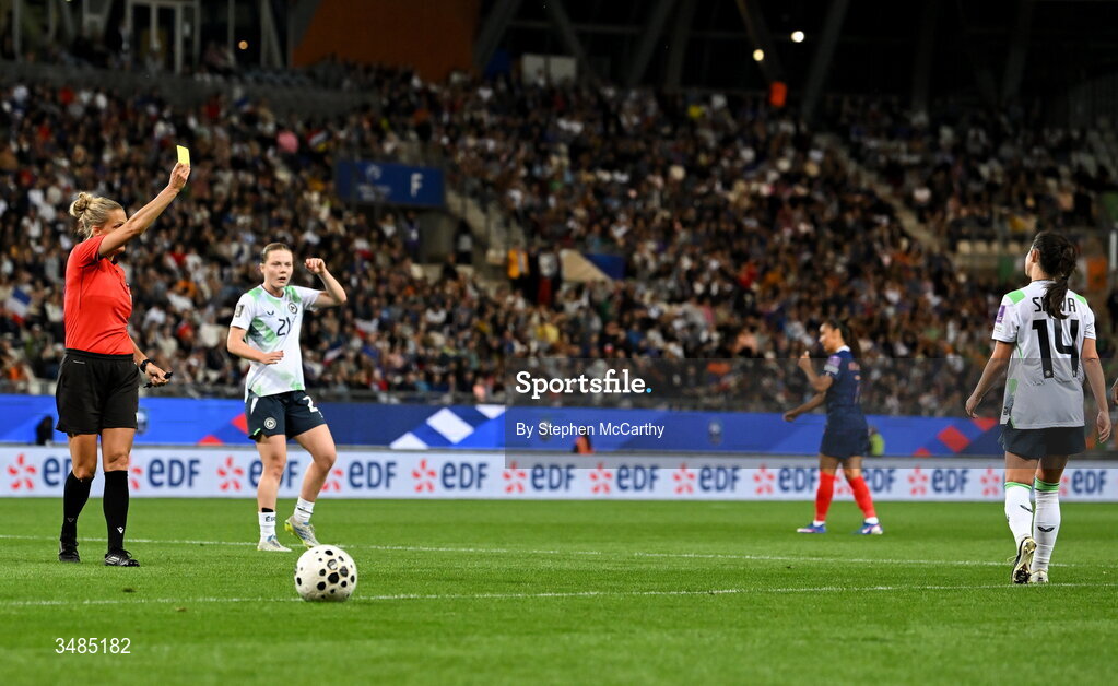 9 June 2026; Marissa Sheva of Republic of Ireland is shown a yellow card by referee Désirée Blanco during the 2027 FIFA Women’s World Cup Qualifier match between France and Republic of Ireland at Stade des Alpes in Grenoble, France. Photo by Stephen McCarthy/Sportsfile