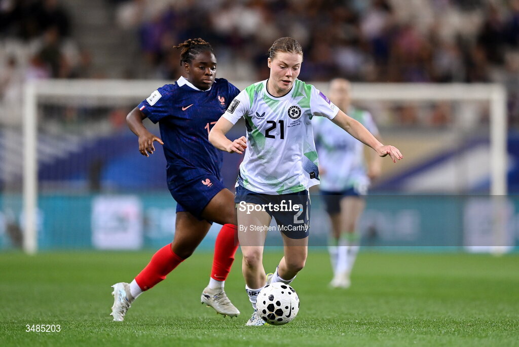 9 June 2026; Emily Murphy of Republic of Ireland in action against Sandy Baltimore of France during the 2027 FIFA Women’s World Cup Qualifier match between France and Republic of Ireland at Stade des Alpes in Grenoble, France. Photo by Stephen McCarthy/Sportsfile