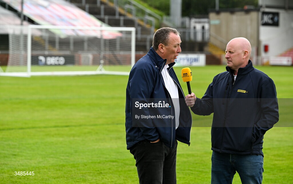 12 June 2026; Eric White, right, and Liam Coyle record a piece to camera for BBC Sport NI before the SSE Airtricity Men’s Premier Division match between Derry City and Bohemians at Find Insurance Celtic Park in Derry. Photo by Stephen McCarthy/Sportsfile