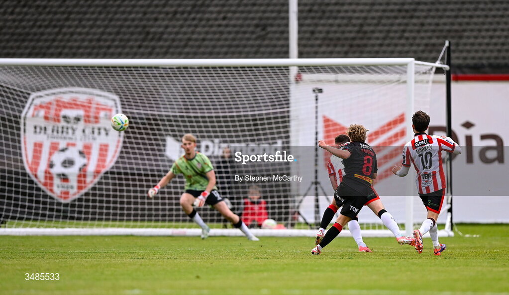 12 June 2026; Harry Vaughan of Bohemians scores his side's first goal past Derry City goalkeeper Eddie Beach during the SSE Airtricity Men’s Premier Division match between Derry City and Bohemians at Find Insurance Celtic Park in Derry. Photo by Stephen McCarthy/Sportsfile