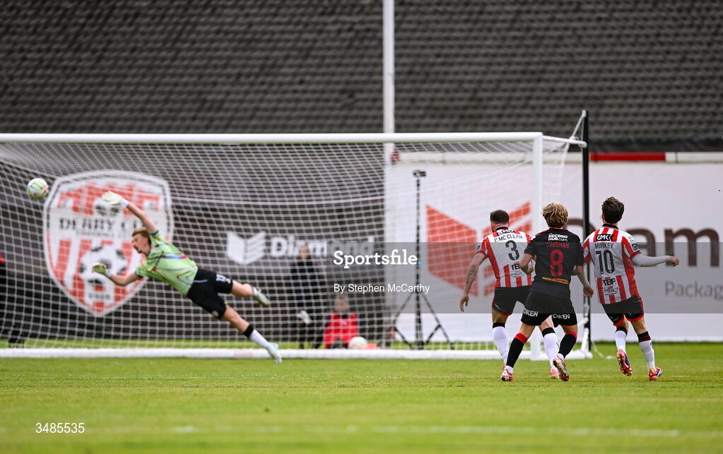 12 June 2026; Harry Vaughan of Bohemians scores his side's first goal past Derry City goalkeeper Eddie Beach during the SSE Airtricity Men’s Premier Division match between Derry City and Bohemians at Find Insurance Celtic Park in Derry. Photo by Stephen McCarthy/Sportsfile