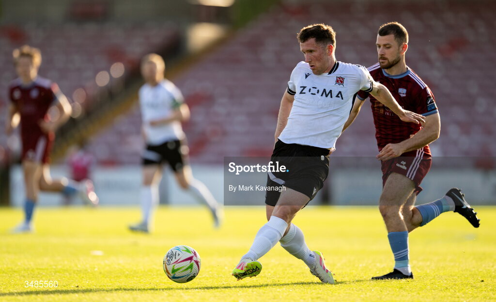 12 June 2026; Bobby Burns of Dundalk in action against Aaron Bolger of Galway United during the SSE Airtricity Men’s Premier Division match between Galway United and Dundalk at Turner's Cross Stadium in Cork. Photo by Mark Kavanagh/Sportsfile