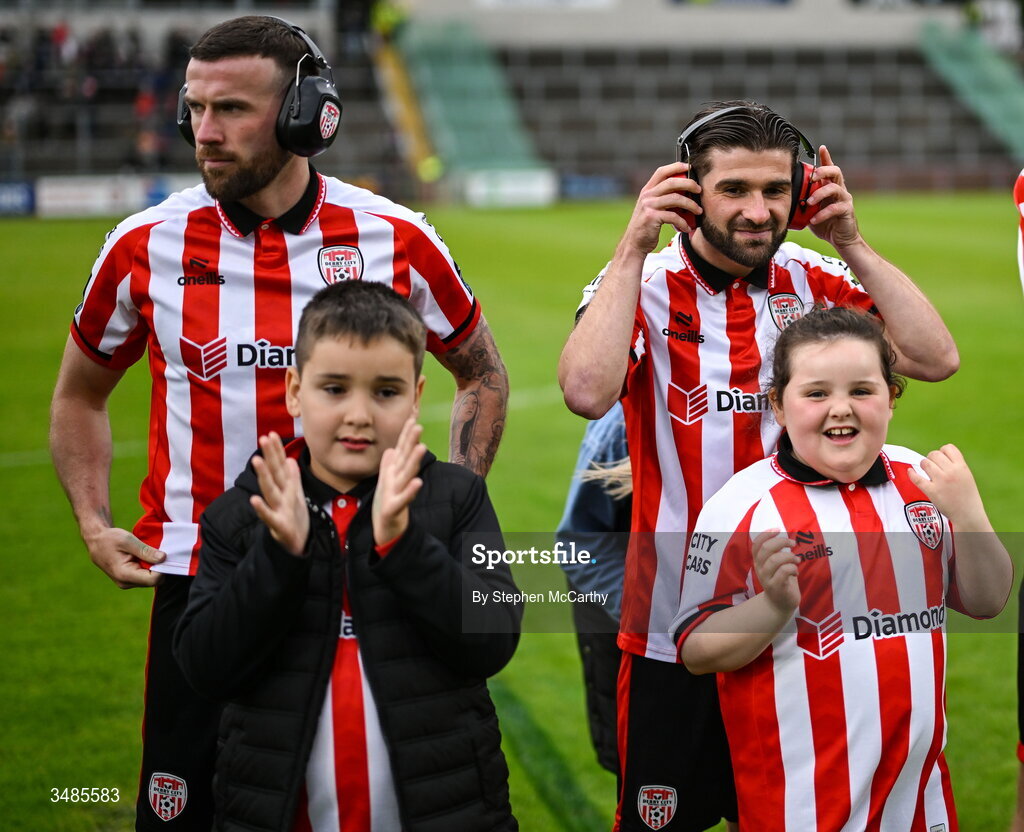 12 June 2026; Patrick McClean, left, and Brandon Fleming of Derry City wear ear defenders as part of a Derry City awareness initiative before the SSE Airtricity Men’s Premier Division match between Derry City and Bohemians at Find Insurance Celtic Park in Derry. Photo by Stephen McCarthy/Sportsfile