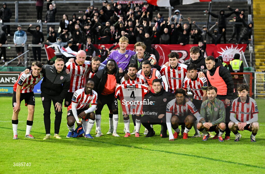 12 June 2026; Derry City players pose for a photograph while holding up a jersey belong to team-mate Jamie Stott after the SSE Airtricity Men’s Premier Division match between Derry City and Bohemians at Find Insurance Celtic Park in Derry. Photo by Stephen McCarthy/Sportsfile