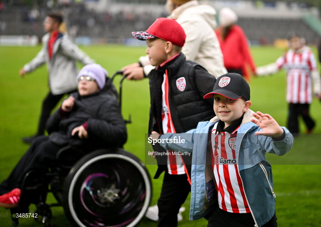 12 June 2026; Ardnashee School and College students perform on the pitch before the SSE Airtricity Men’s Premier Division match between Derry City and Bohemians at Find Insurance Celtic Park in Derry. Photo by Stephen McCarthy/Sportsfile