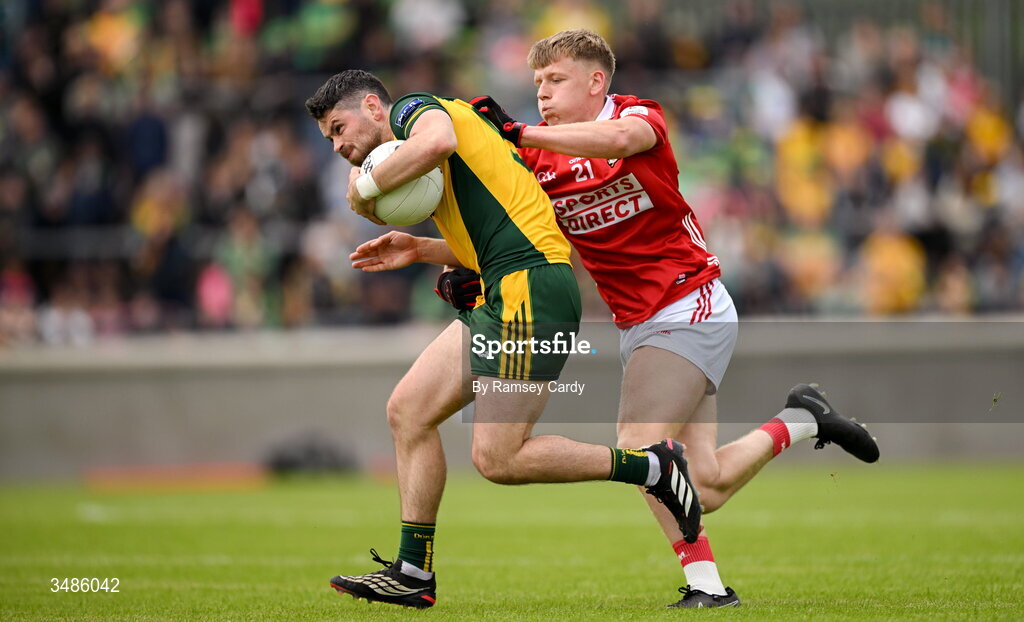 13 June 2026; Ryan McHugh of Donegal in action against Dara Sheedy of Cork during the GAA Football All-Ireland Senior Championship Round 2A match between Donegal and Cork at MacCumhaill Park in Ballybofey, Donegal. Photo by Ramsey Cardy/Sportsfile