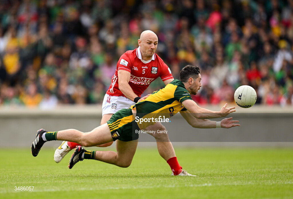 13 June 2026; Ryan McHugh of Donegal in action against Brian O'Driscoll of Cork during the GAA Football All-Ireland Senior Championship Round 2A match between Donegal and Cork at MacCumhaill Park in Ballybofey, Donegal. Photo by Ramsey Cardy/Sportsfile