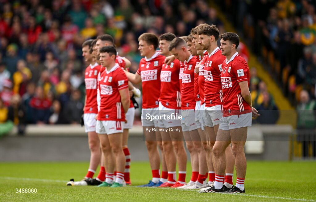 13 June 2026; The Cork team during the playing of the National Anthem before the GAA Football All-Ireland Senior Championship Round 2A match between Donegal and Cork at MacCumhaill Park in Ballybofey, Donegal. Photo by Ramsey Cardy/Sportsfile