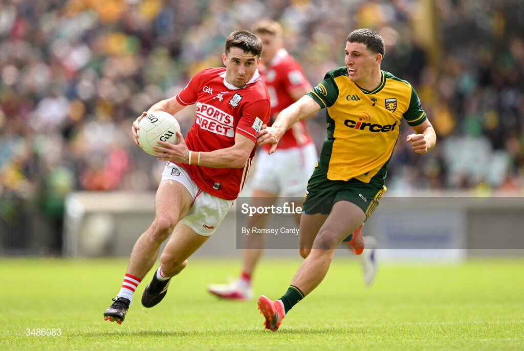 13 June 2026; Chris Óg Jones of Cork in action against Finnbarr Roarty of Donegal during the GAA Football All-Ireland Senior Championship Round 2A match between Donegal and Cork at MacCumhaill Park in Ballybofey, Donegal. Photo by Ramsey Cardy/Sportsfile