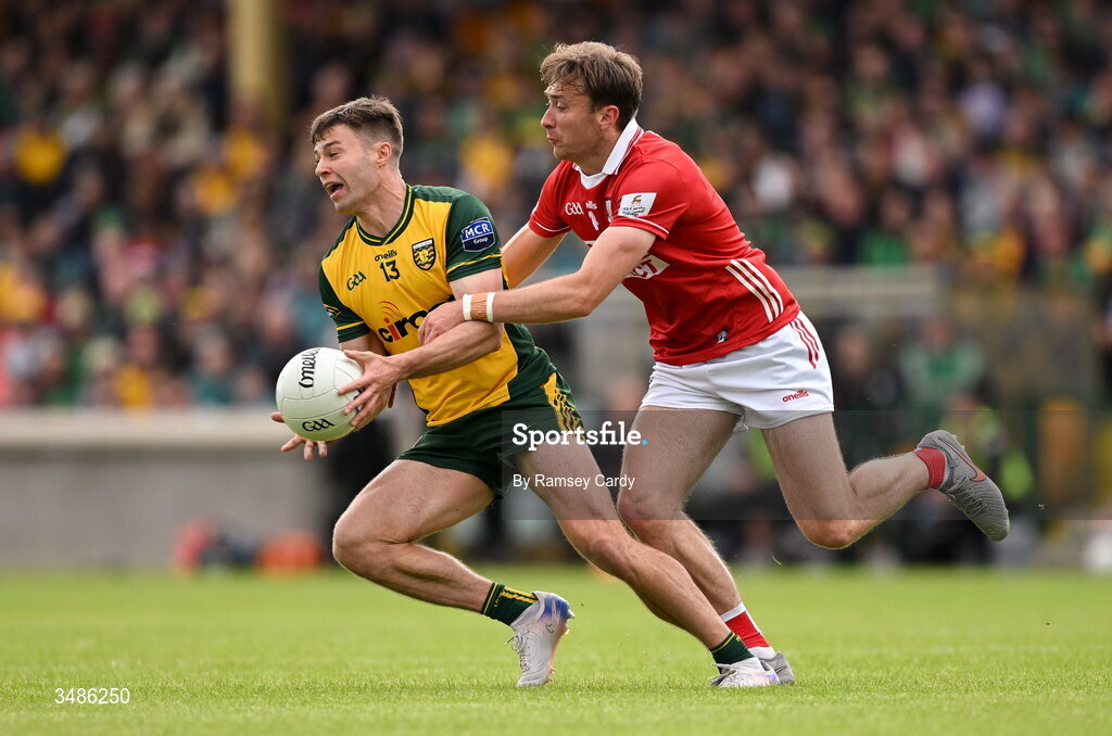 13 June 2026; Conor O'Donnell of Donegal in action against Seán Meehan of Cork during the GAA Football All-Ireland Senior Championship Round 2A match between Donegal and Cork at MacCumhaill Park in Ballybofey, Donegal. Photo by Ramsey Cardy/Sportsfile