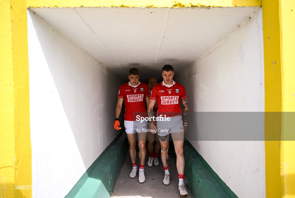 13 June 2026; Ian Maguire, left, and Seán Walsh of Cork make their way out for the second-half of the GAA Football All-Ireland Senior Championship Round 2A match between Donegal and Cork at MacCumhaill Park in Ballybofey, Donegal. Photo by Ramsey Cardy/Sportsfile