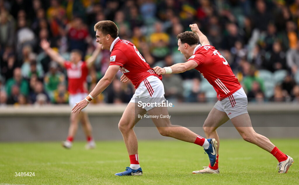 13 June 2026; Tommy Walsh, left, and Daniel O'Mahony of Cork celebrate after the GAA Football All-Ireland Senior Championship Round 2A match between Donegal and Cork at MacCumhaill Park in Ballybofey, Donegal. Photo by Ramsey Cardy/Sportsfile