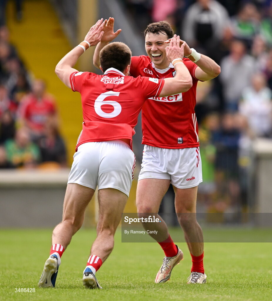 13 June 2026; Daniel O'Mahony, right, and Tommy Walsh of Cork celebrate after the GAA Football All-Ireland Senior Championship Round 2A match between Donegal and Cork at MacCumhaill Park in Ballybofey, Donegal. Photo by Ramsey Cardy/Sportsfile
