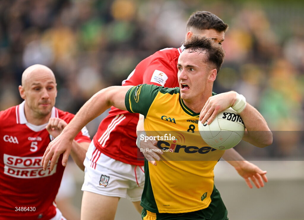 13 June 2026; Jason McGee of Donegal in action against Rory Maguire of Cork during the GAA Football All-Ireland Senior Championship Round 2A match between Donegal and Cork at MacCumhaill Park in Ballybofey, Donegal. Photo by Ramsey Cardy/Sportsfile